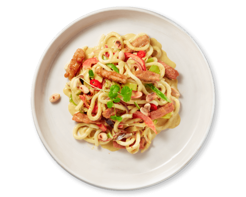 Snelle kokospinda-noedels met veggie wokreepjes