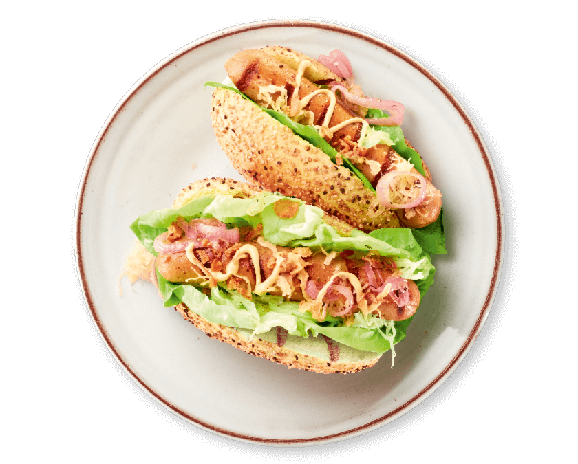 Duitse hotdog met veggie braadworst, zuurkool en gekaramelliseerde ui